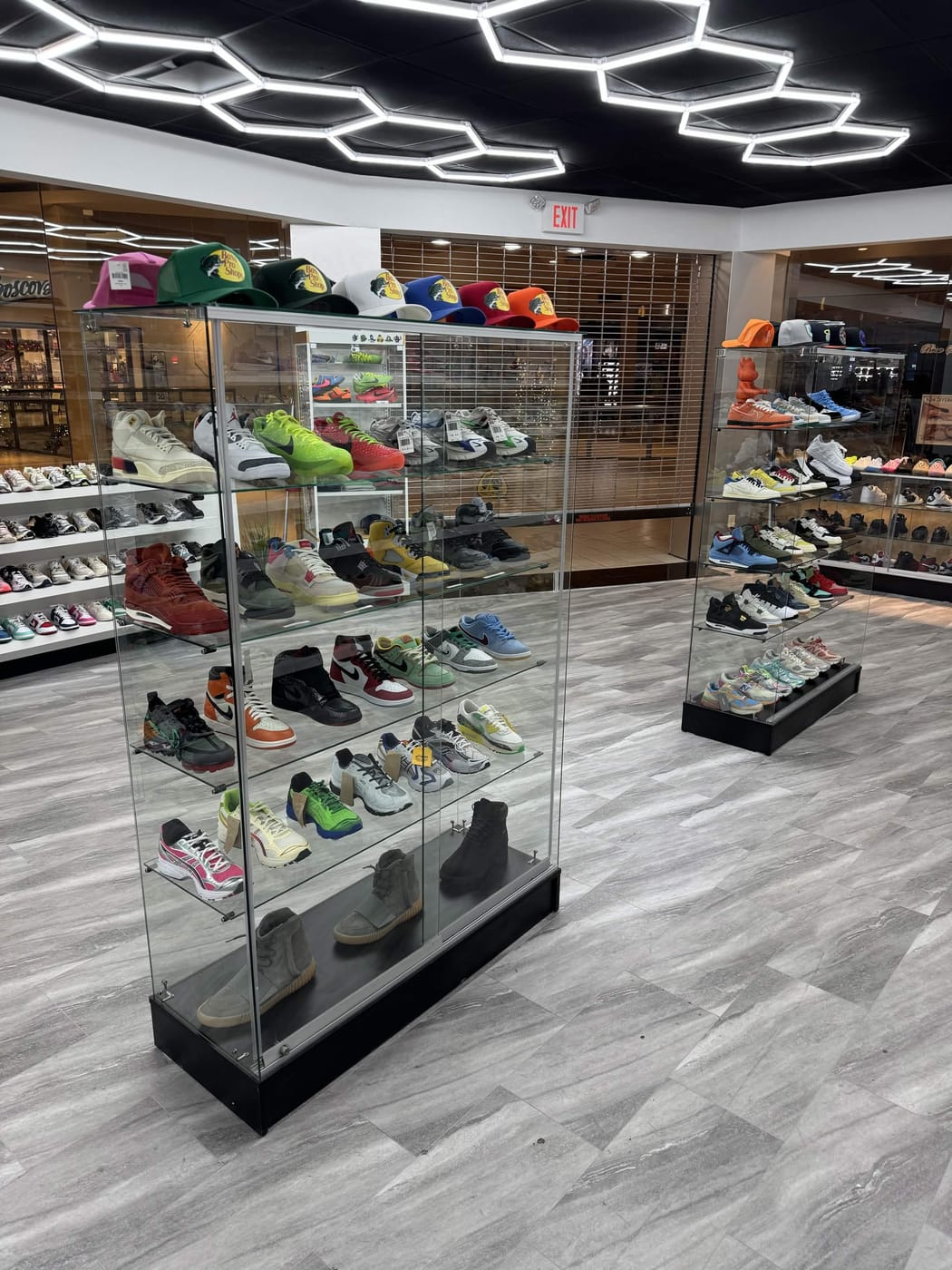 Sole Control NJ — glass display case with Yeezys and grails